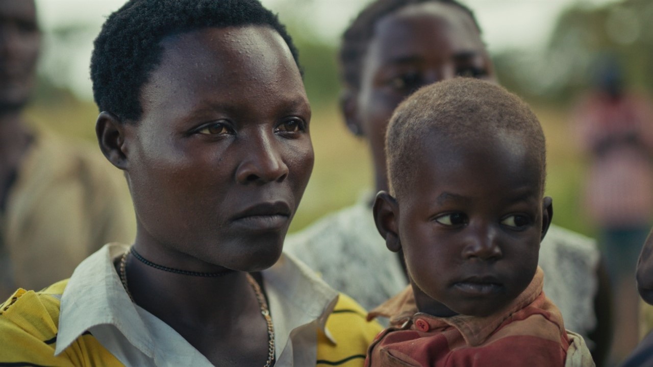 Close-up of a woman holding a young boy