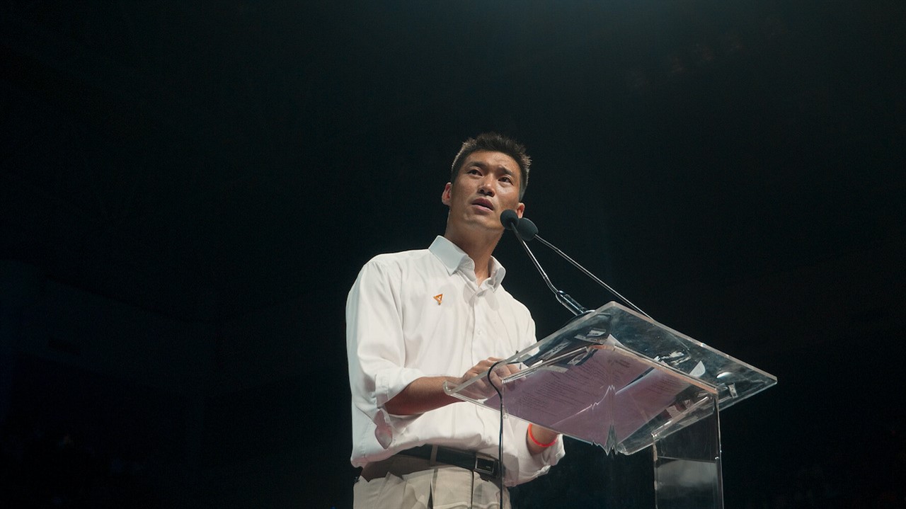 Man standing at a podium