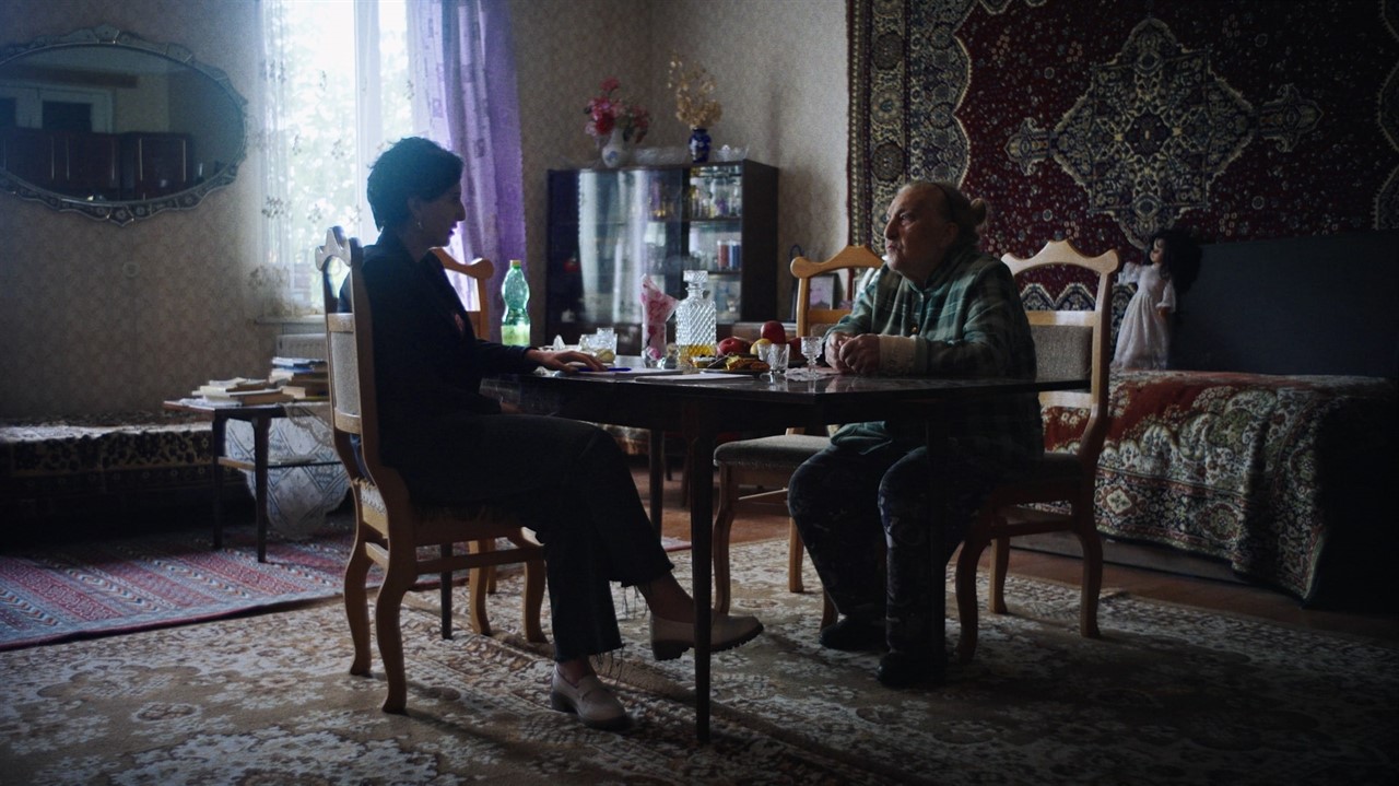 People sitting around a dining room table