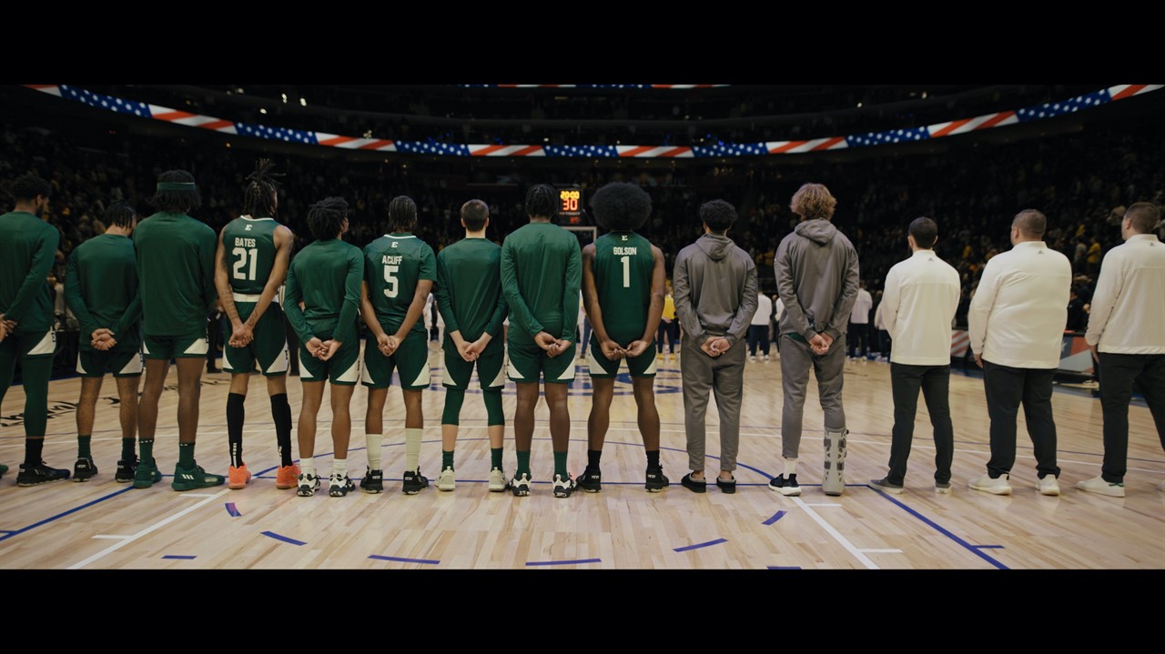 Lineup of a basketball team on a basketball court