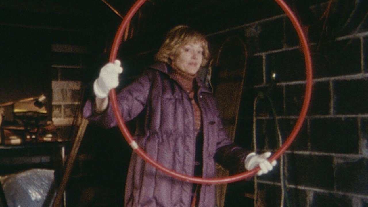 Woman holding a hula hoop