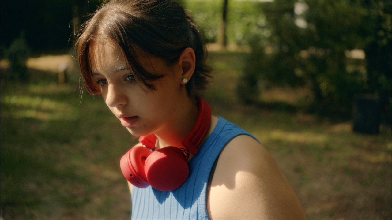 Closeup of a teenage girl with headphones