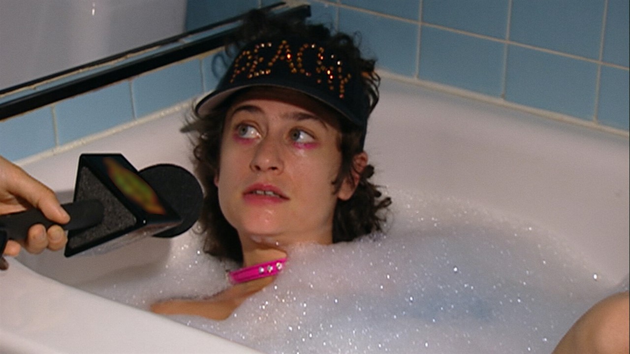 Peaches being interviewed in a bubble bath