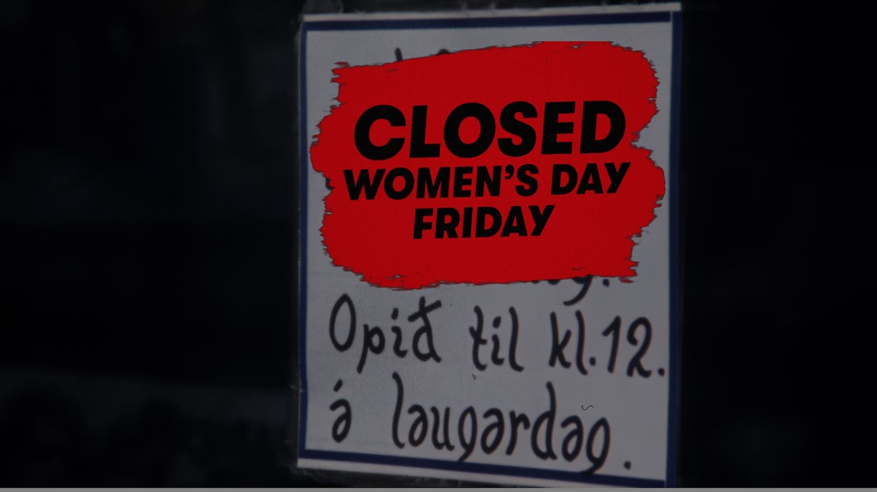 Sign reading CLOSED Women's Day Friday