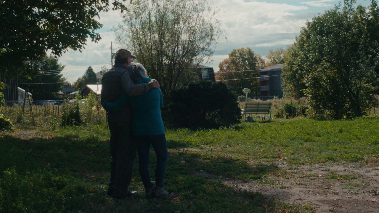 Couple embracing in a rual setting