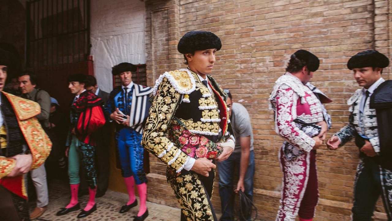 a group of men dressed as matadors