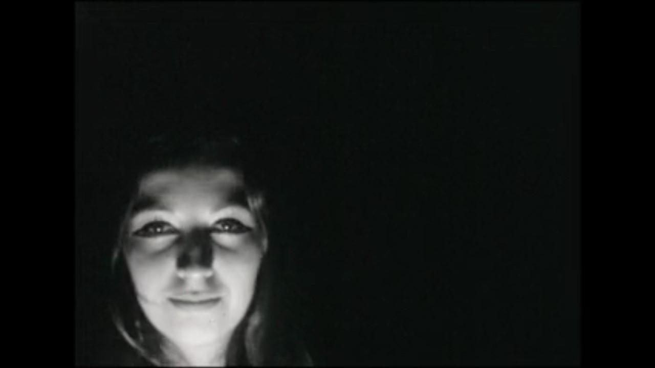 A woman looking at the camera