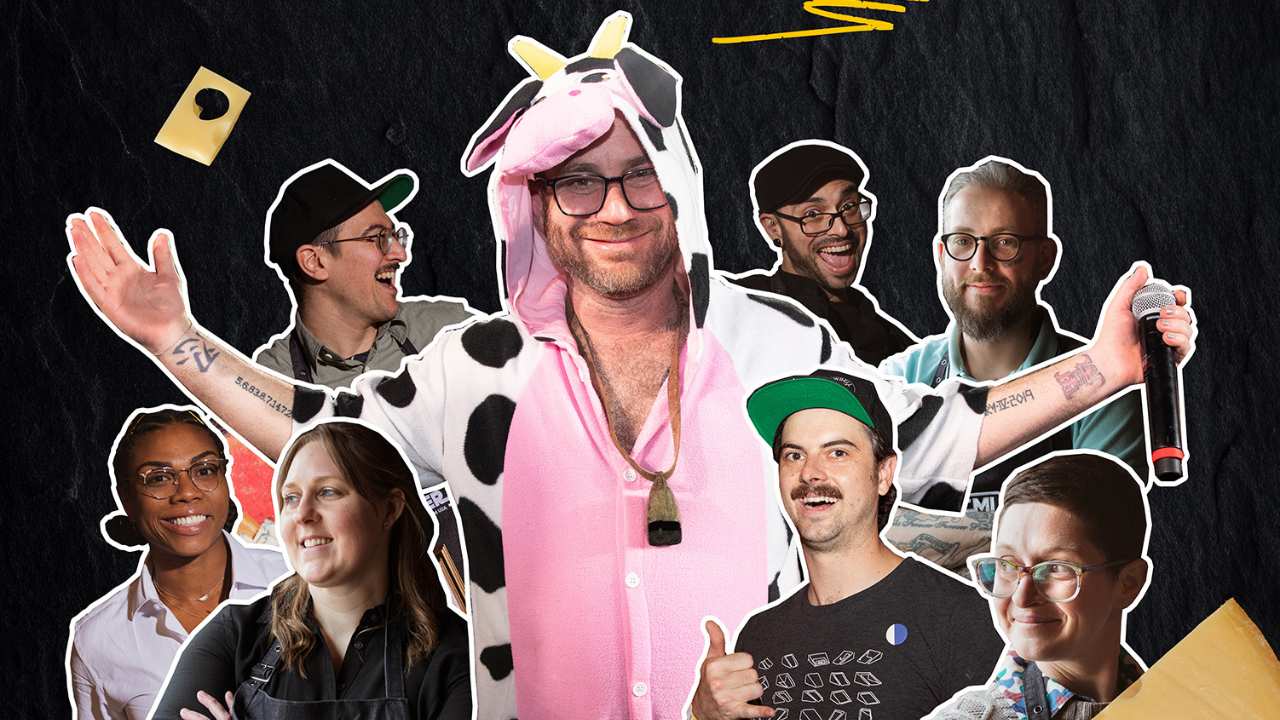 man in a cow suit with a group of people