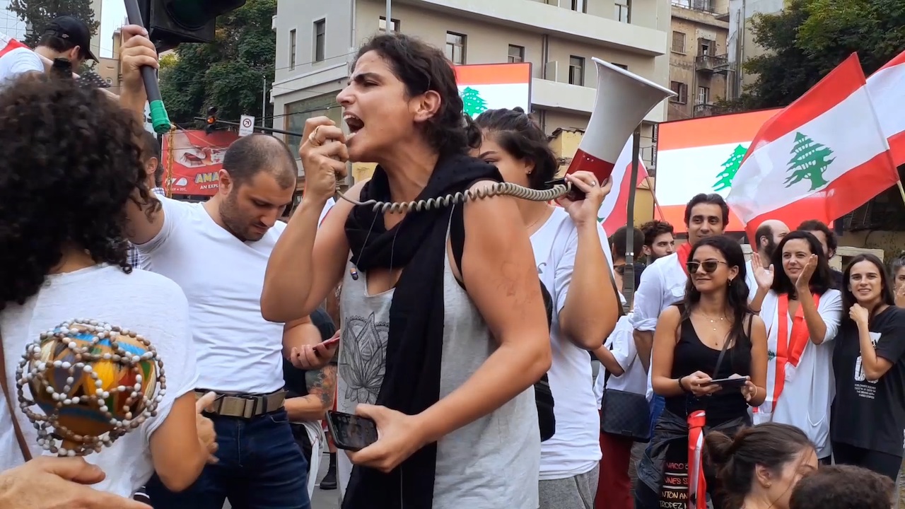 Group of protesters with a megaphone