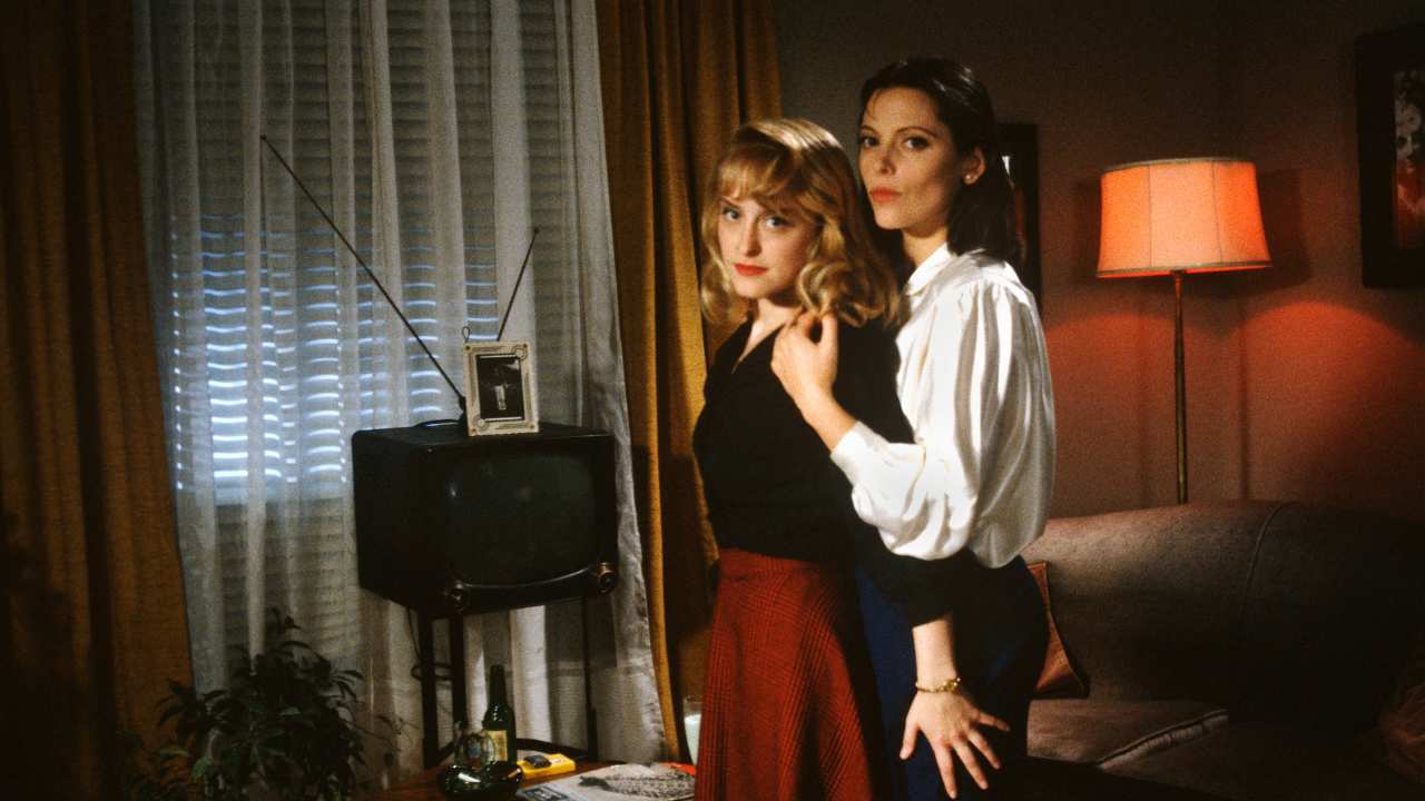 two women embracing each other