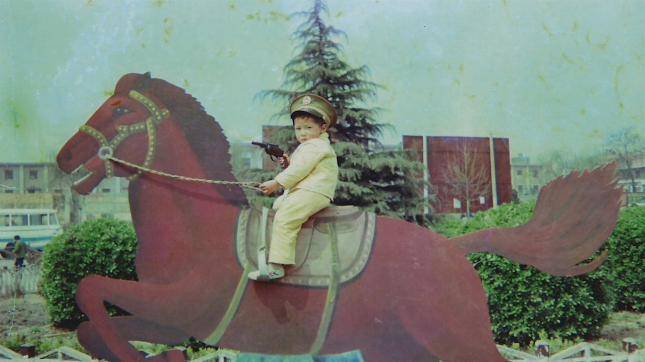 Chinese child on a painted horse
