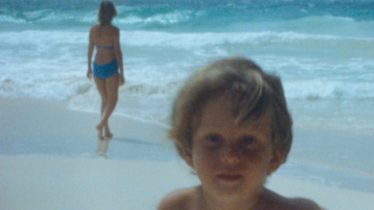 Child and woman on beach