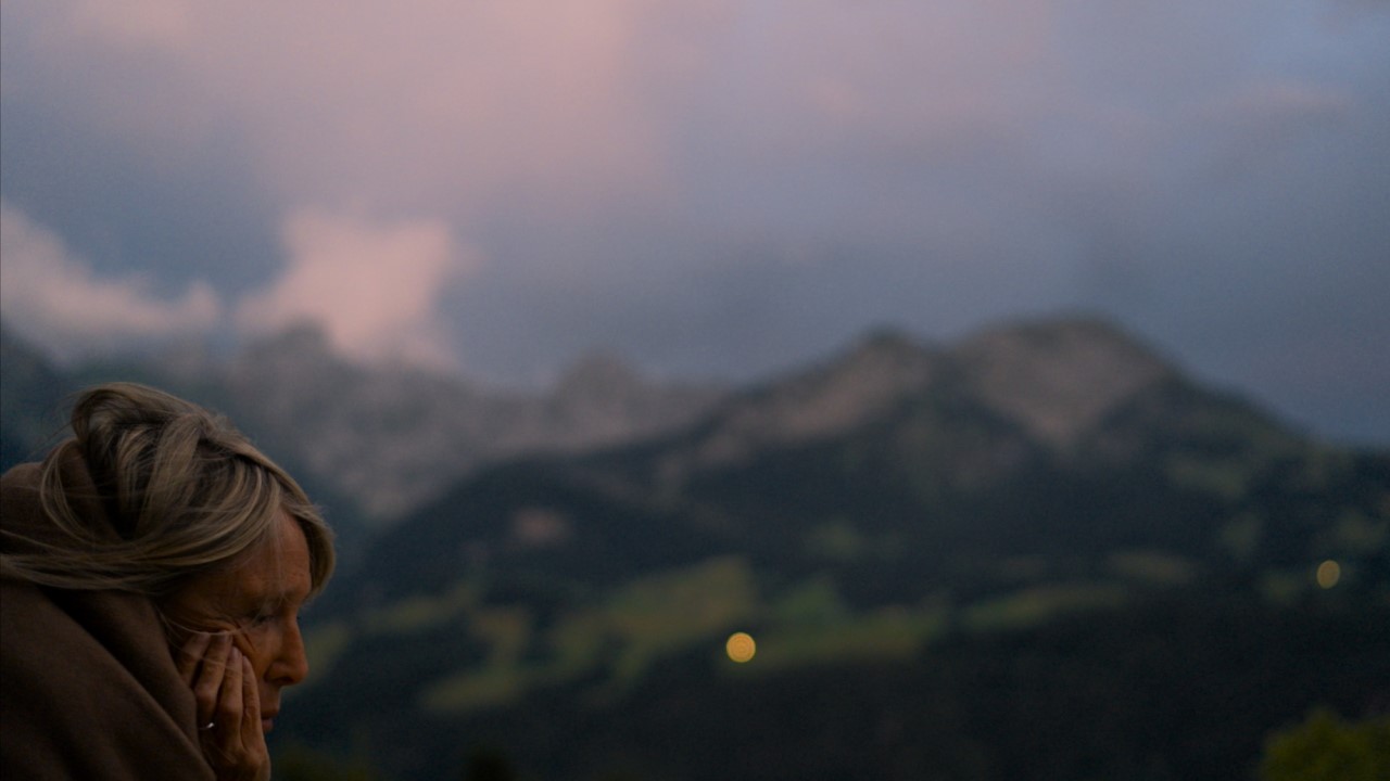 Woman in front of mountain