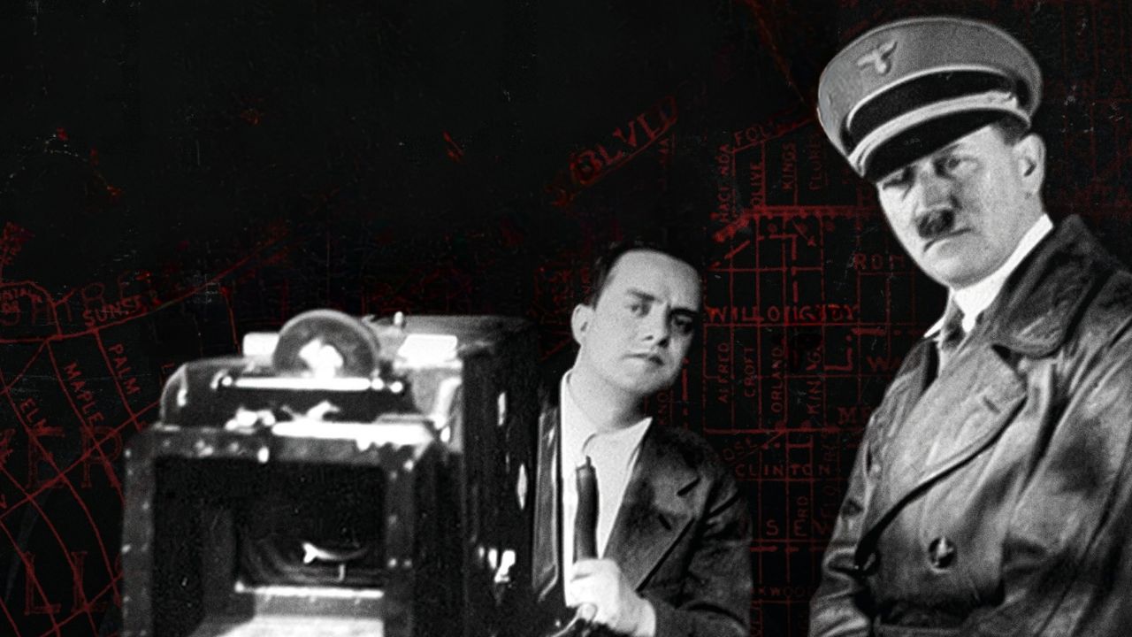 a man with a movie camera next to Adolph Hitler