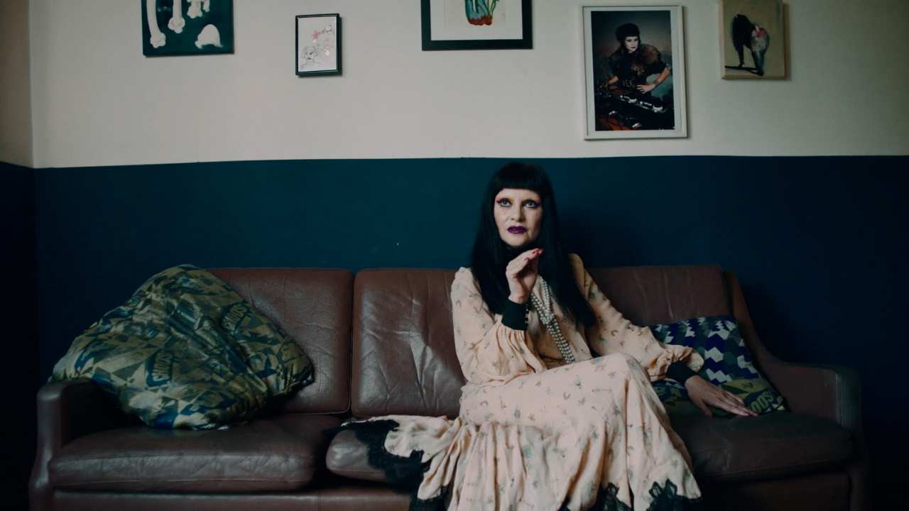 a woman sitting on a couch