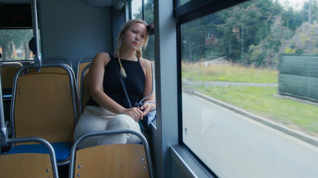 Woman sitting on a bus