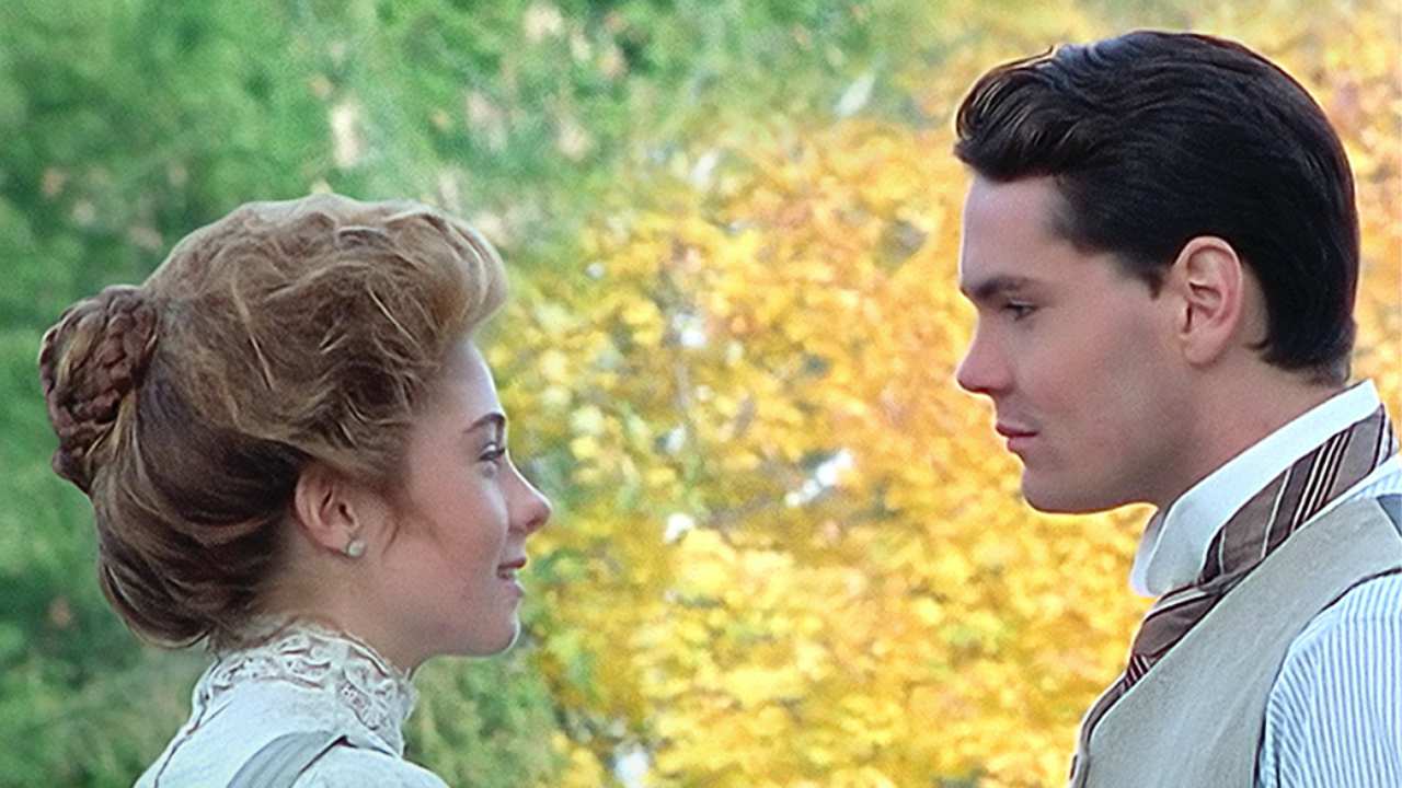 a woman and man looking at each other