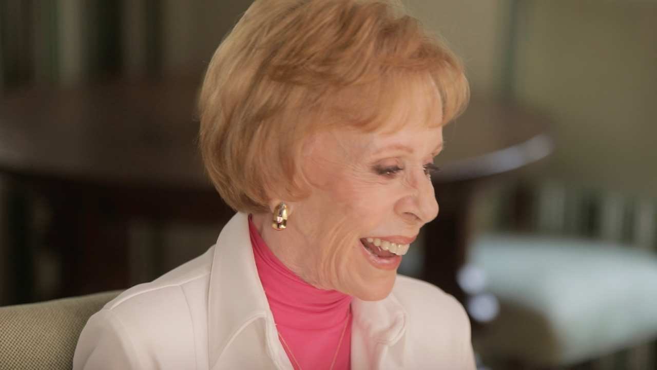 Carol Burnett smiling and looking to the right