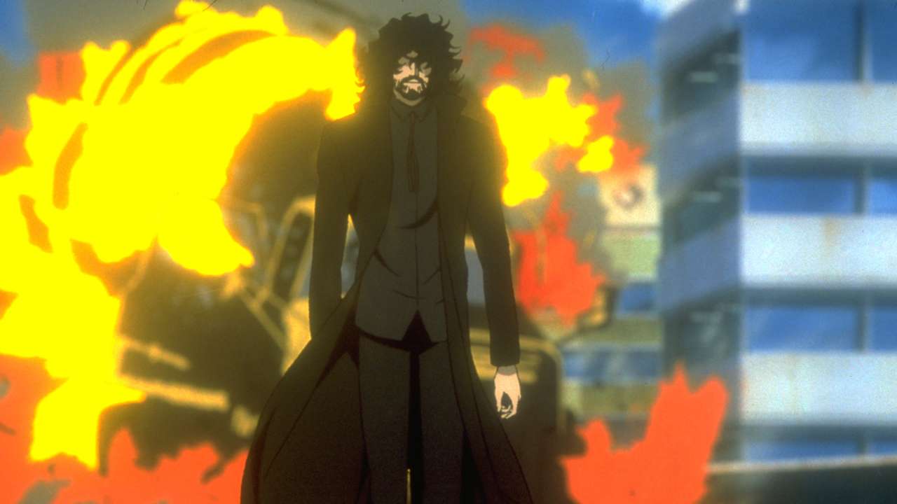 a man with a beard in front of an explosion