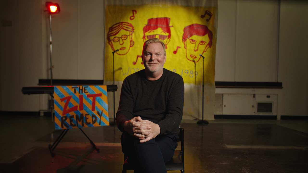 Stefan Brogren sitting in a chair