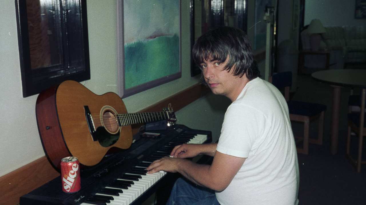 Daniel Johnston playing piano