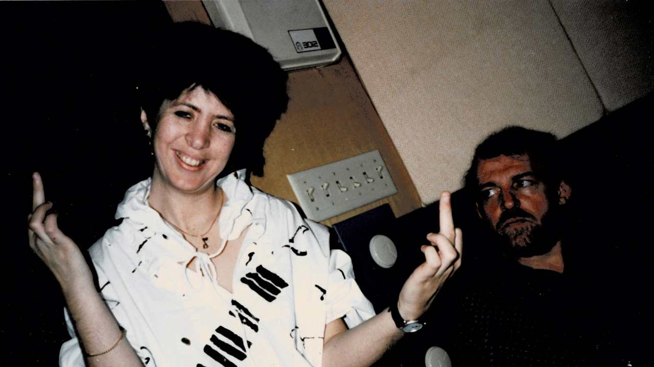 vintage pic of Diane Warren standing next to a man