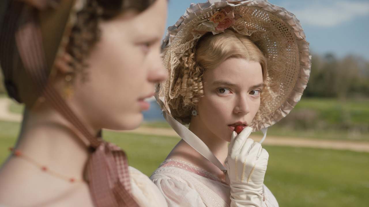 two women in frilly bonnets