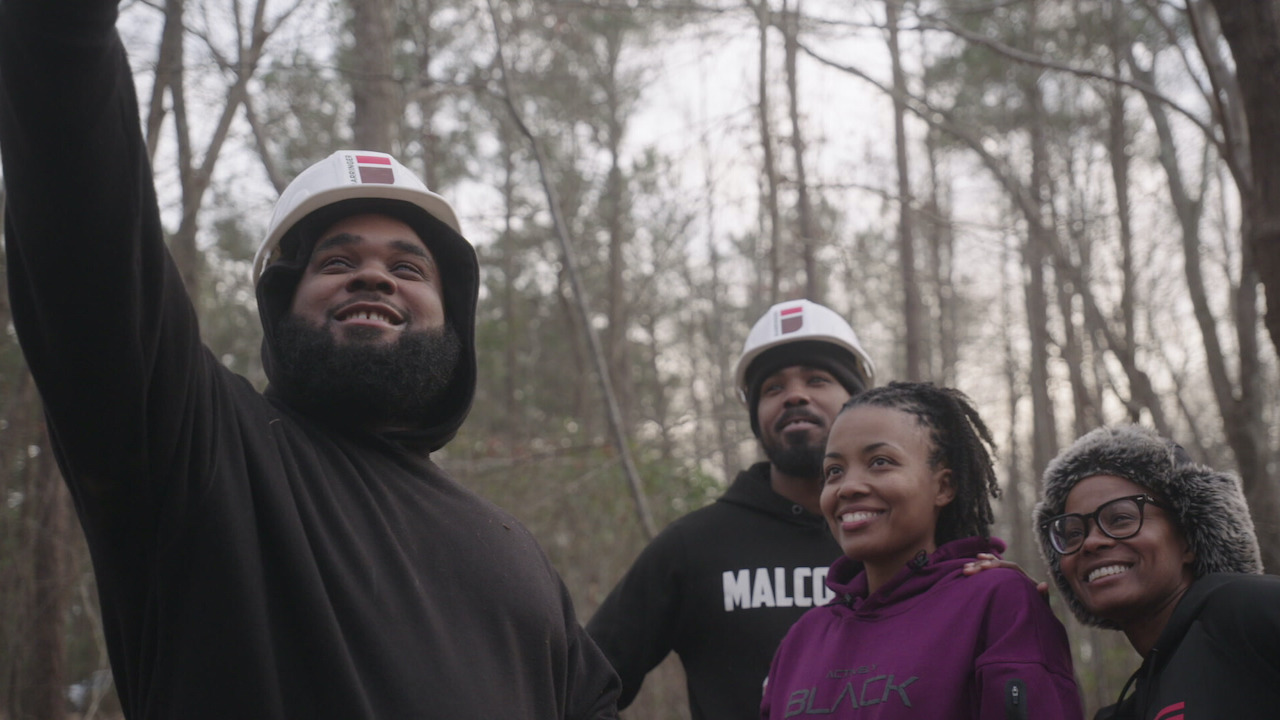 Smiling family in a forest