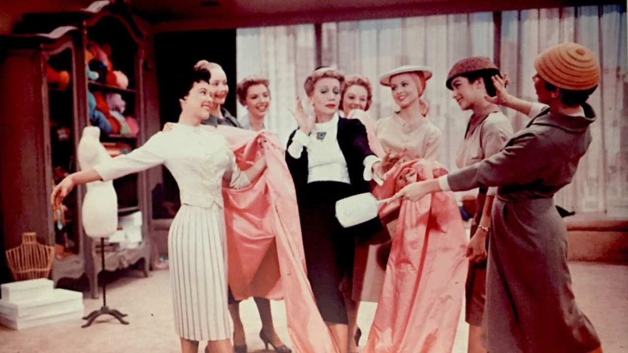 a group of women looking various pink outfits