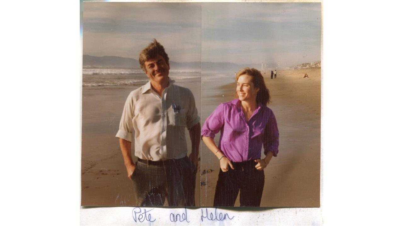 Old photo of Pete and Helen on a beach