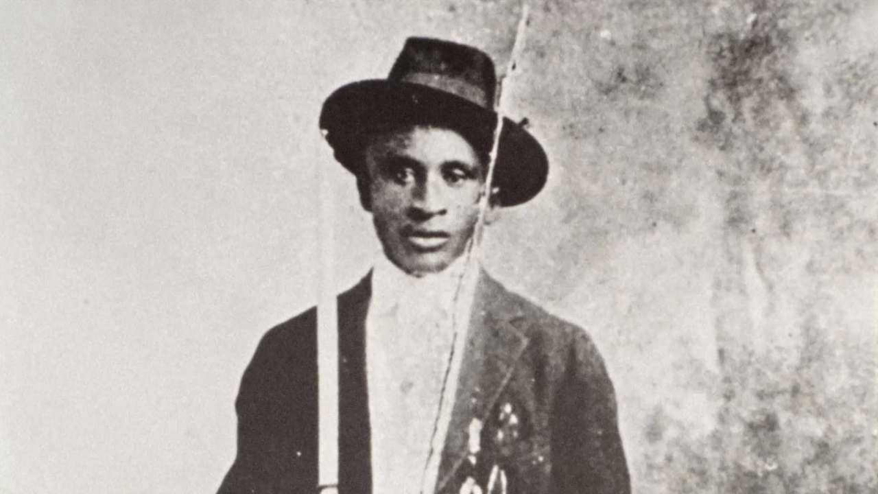 a vintage photo of a man in a hat