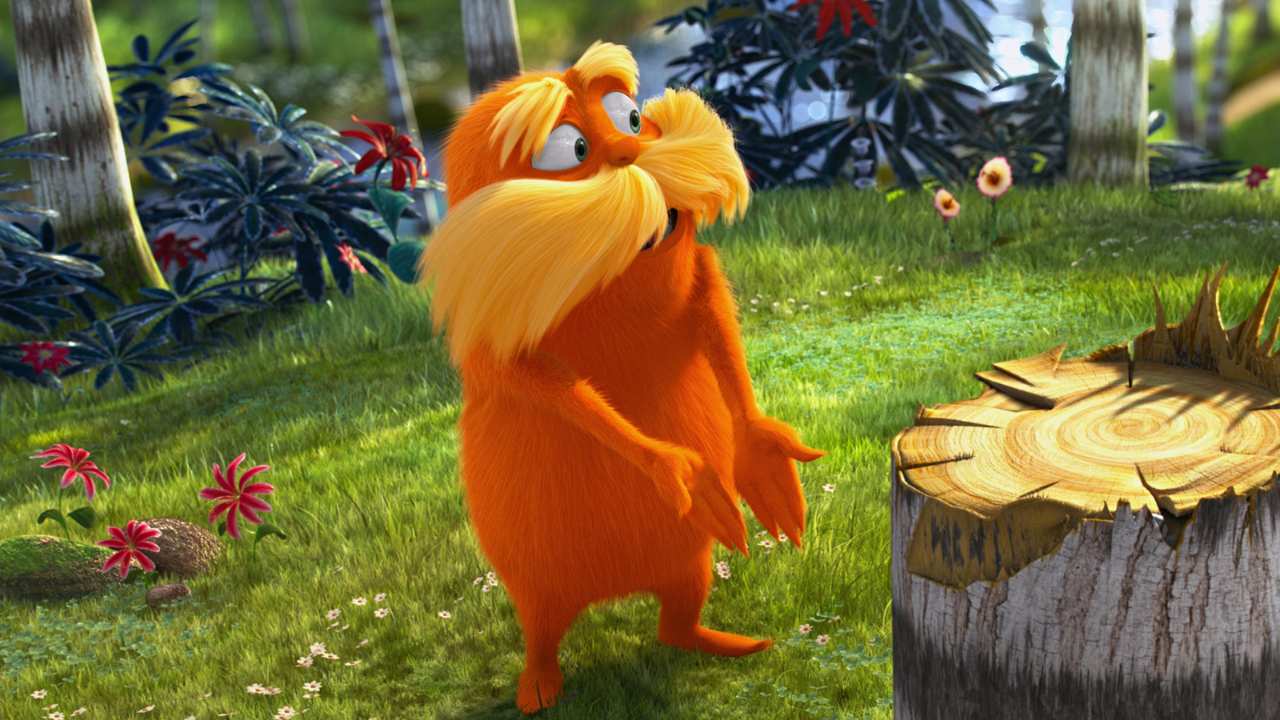 Animated orange standing creature in front of tree