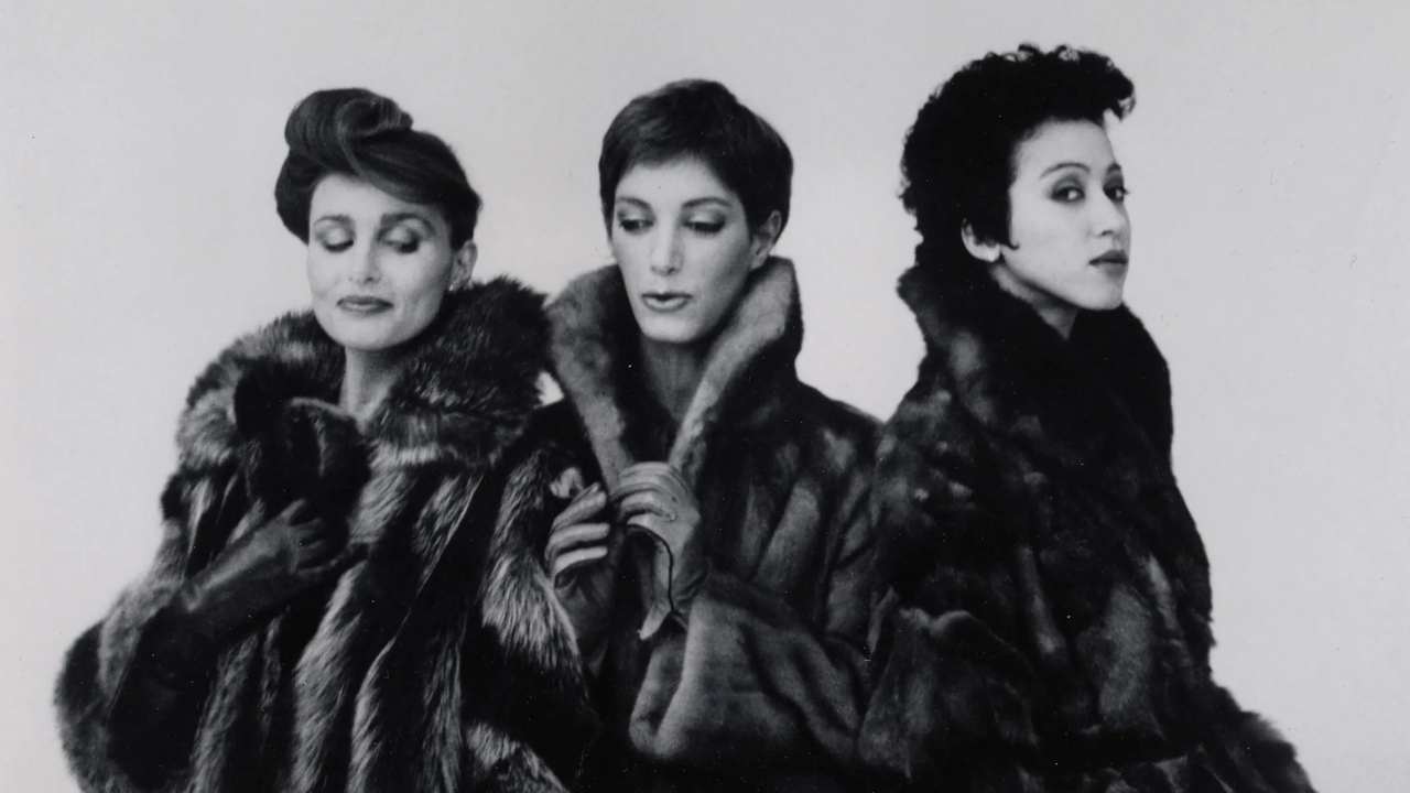 three women in fur coats