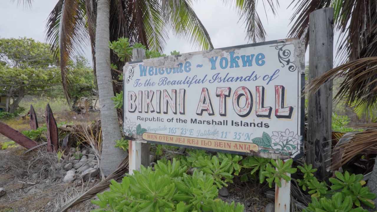 a welcome sign for Bikini Atoll