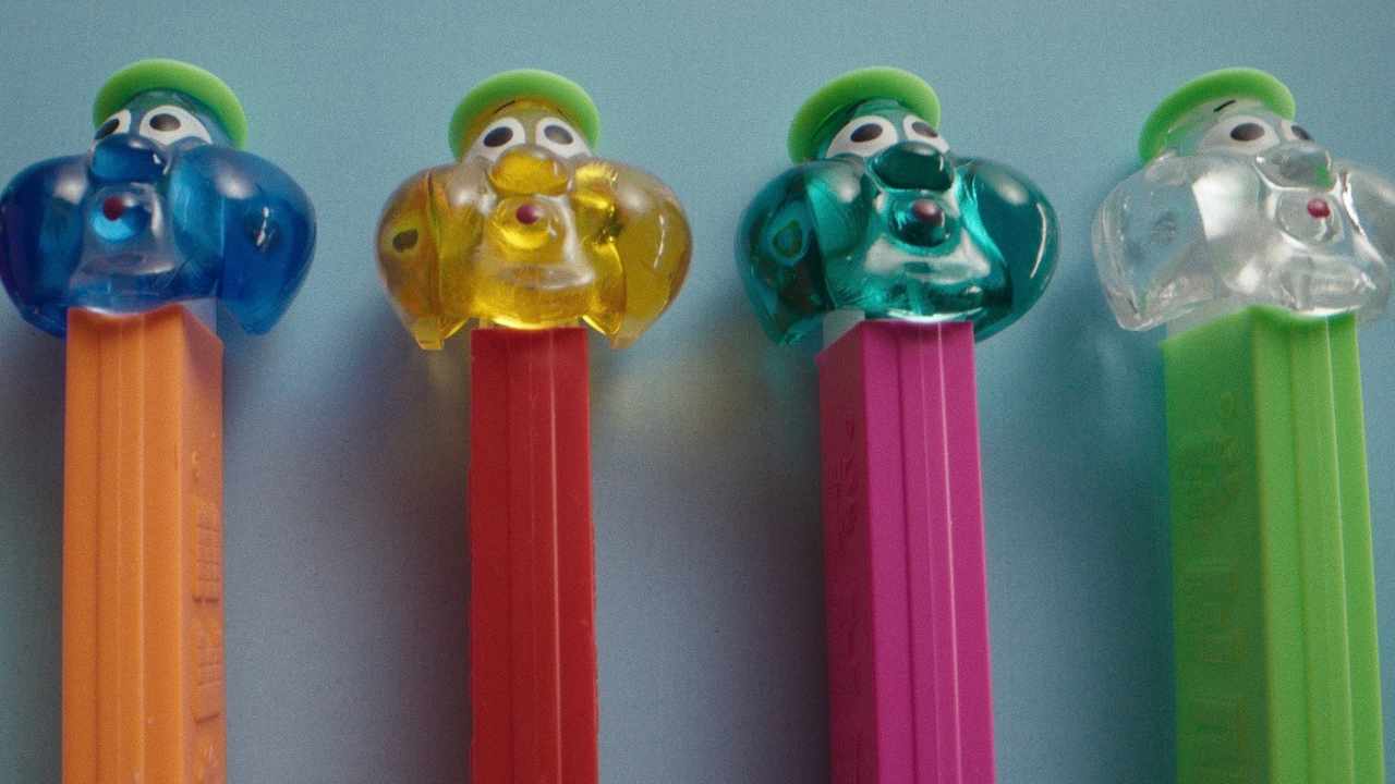 four Pez candy dispensers