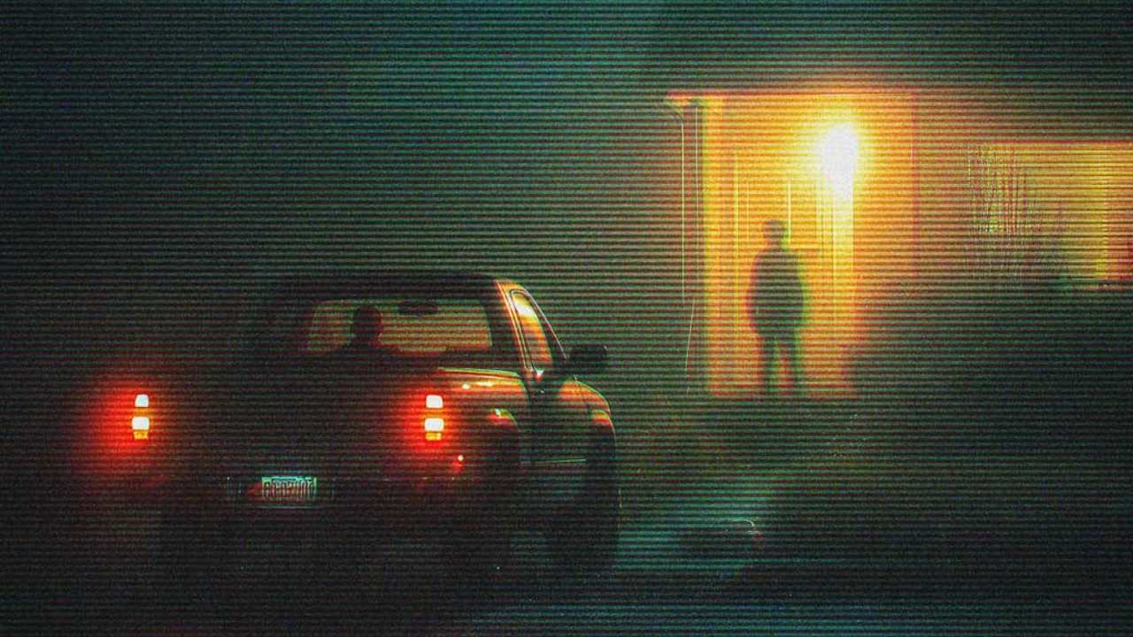 a person in a truck & a person in front of a house