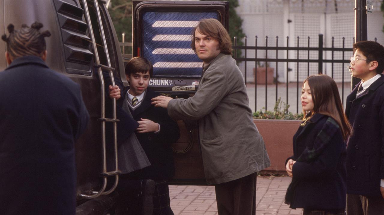 man and children near the minivan