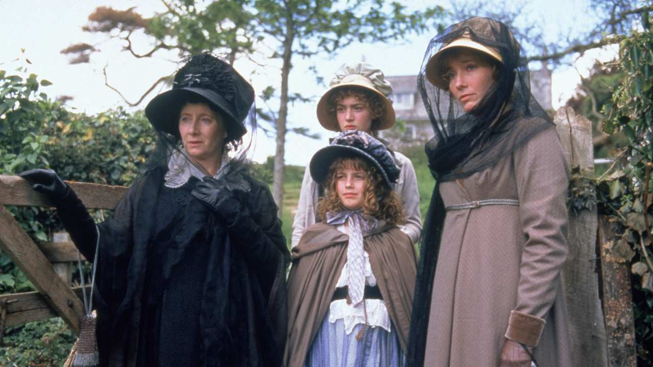 three women and a young girl standing together