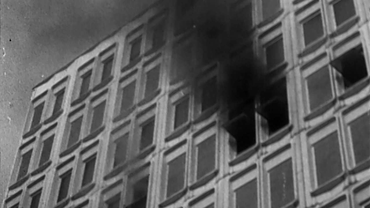 smoke coming out of a building window